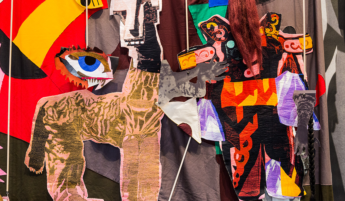 A bright collage of animals, body parts, colours and materials