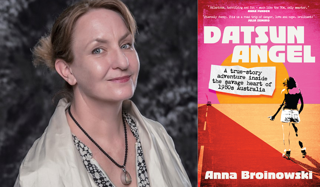 Anna Broinowski wears a white shawl and a necklace. Anna has blonde hair pulled back and stands in front of a dark background.