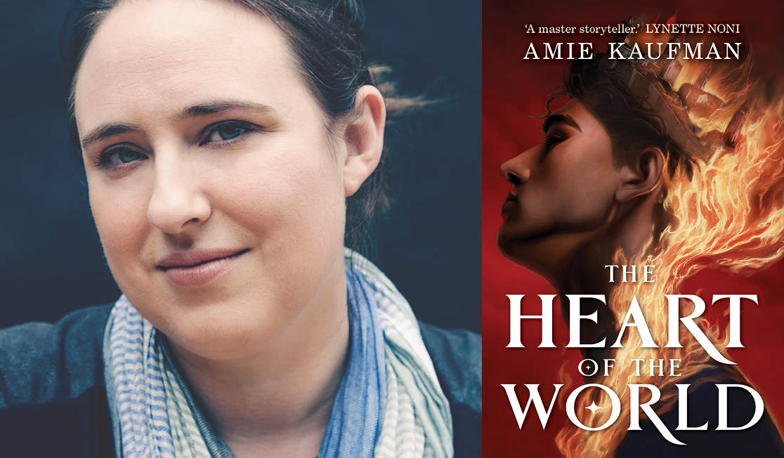 Amie Kaufman wears a stripey scarf and has brown hair pulled back. Amie is smiling in front of a dark background.