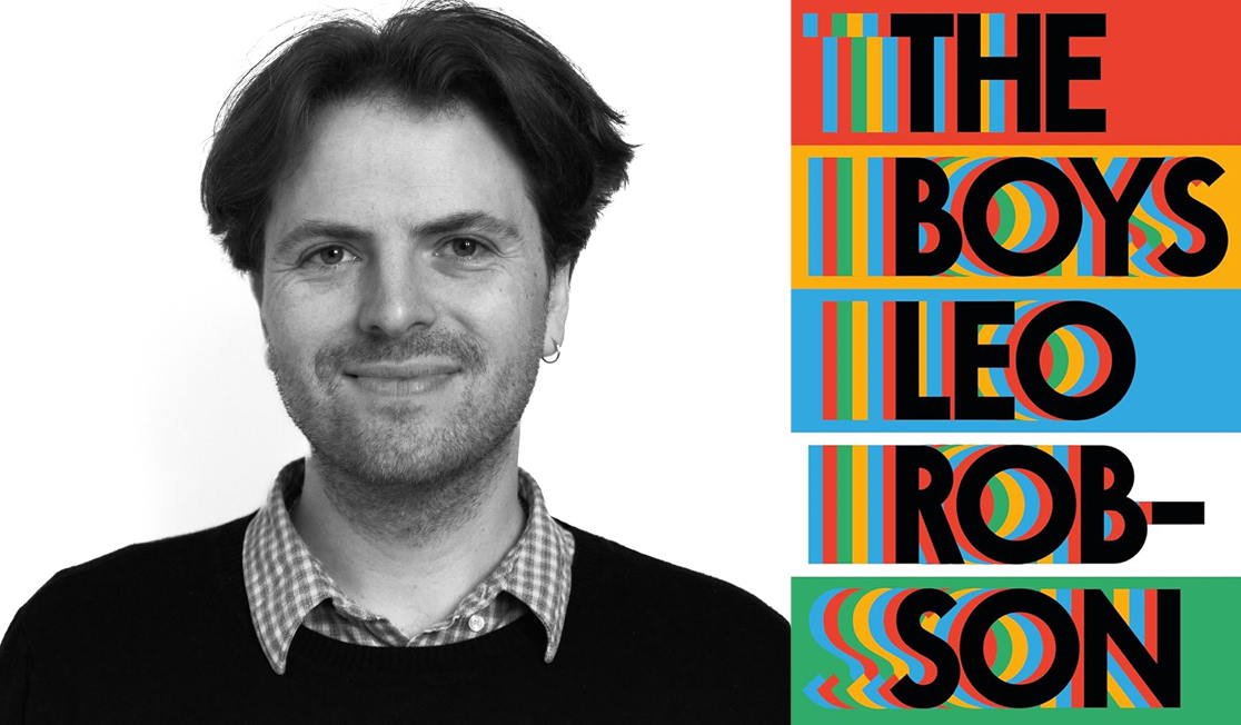 A black and white headshot of Leo Robson wearing a checkered shirt and an earing on the left ear