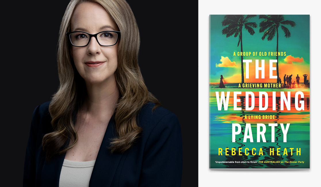 Rebecca wears a dark blazer with a beige top underneath, she has ash mid-length hair and wears dark-rimmed glasses